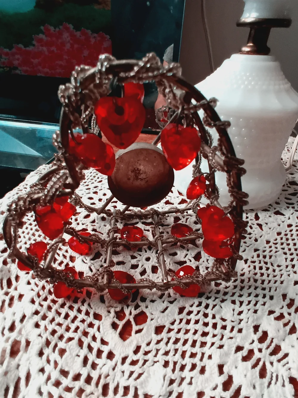Handcrafted Metal Candle Holder with Red Glass Accents